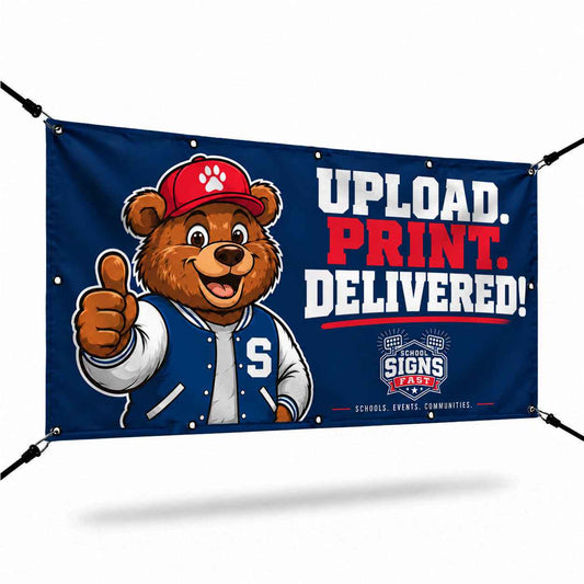 Navy vinyl banner with a cartoon bear mascot and the words Upload. Print. Delivered!, hung with bungee cords